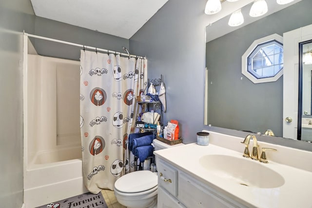 bathroom featuring vanity, shower / bath combination with curtain, toilet, and tile patterned floors