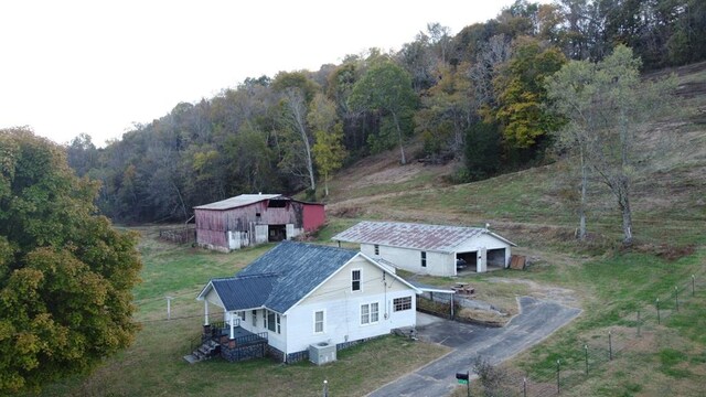 bird's eye view featuring a forest view