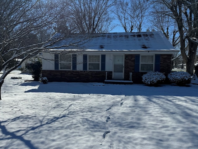 view of front of home with brick siding