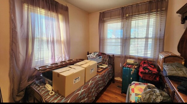 bedroom featuring wood finished floors