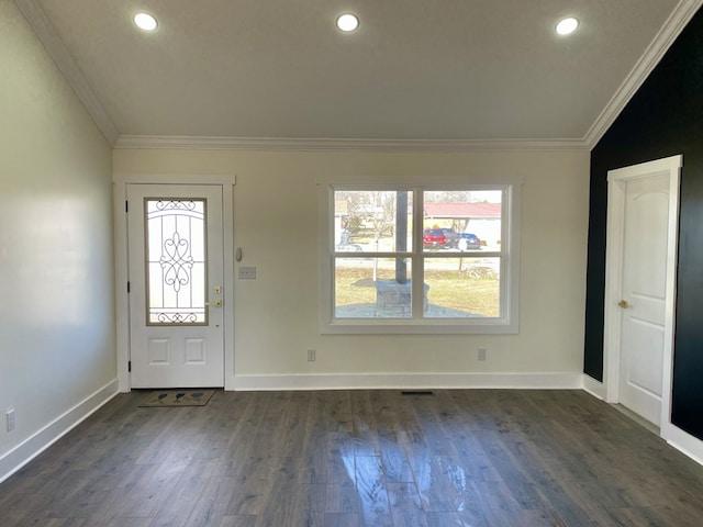 entrance foyer featuring ornamental molding, recessed lighting, dark wood finished floors, and baseboards