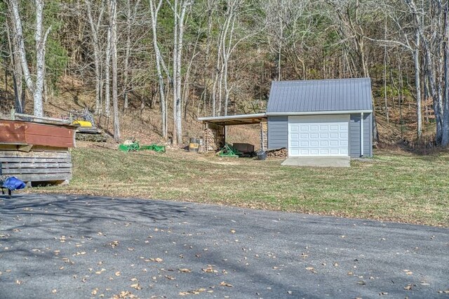 exterior space featuring a garage and driveway