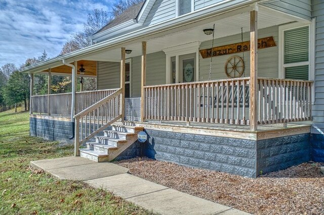 doorway to property featuring covered porch