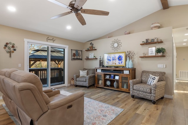 living room with lofted ceiling with beams, ceiling fan, visible vents, baseboards, and light wood-style floors