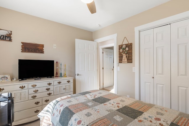 bedroom featuring a ceiling fan and a closet