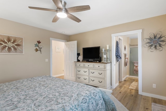 bedroom featuring baseboards, ceiling fan, and light wood-style floors