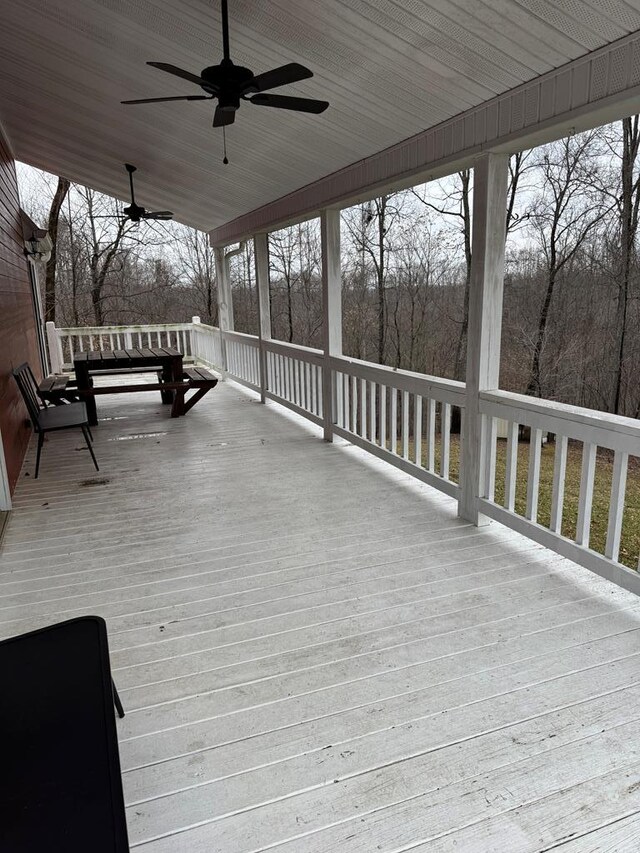 wooden terrace with ceiling fan