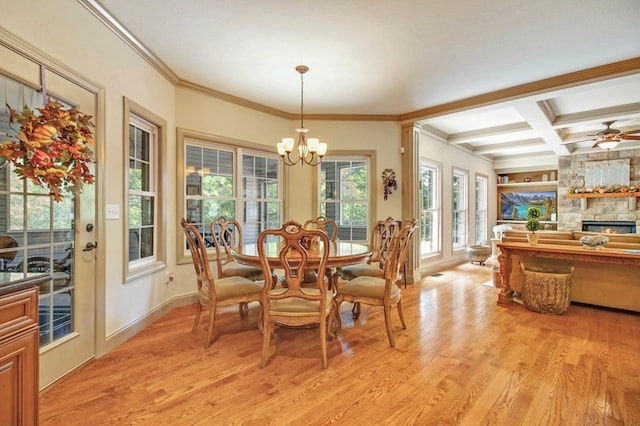 dining room with beam ceiling, coffered ceiling, baseboards, and light wood finished floors