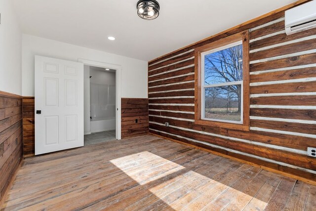 full bathroom with bathtub / shower combination, vanity, and a spacious closet