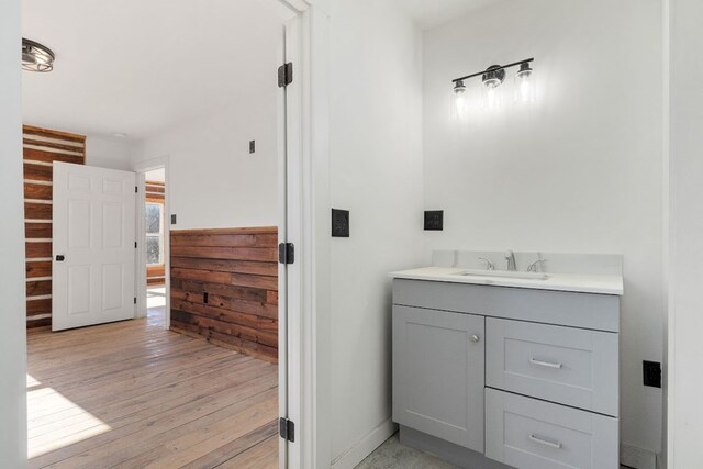 unfurnished room with a wall mounted air conditioner, dark wood finished floors, and recessed lighting