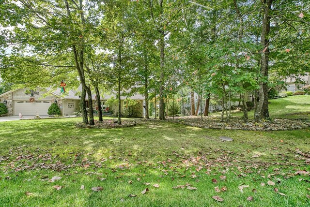 view of yard with an attached garage