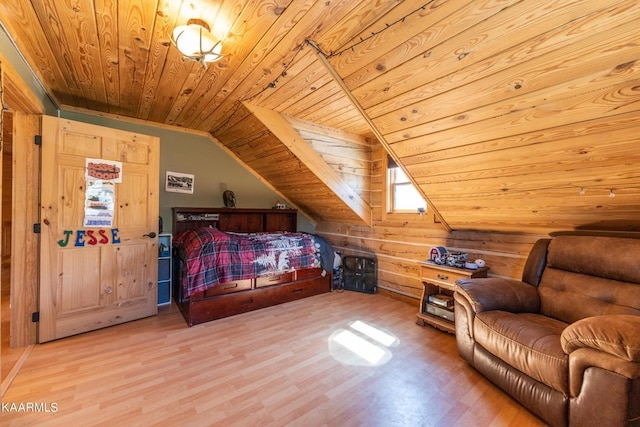 bedroom featuring vaulted ceiling, wooden ceiling, wood finished floors, and wooden walls