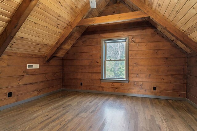 bonus room with wooden ceiling, vaulted ceiling with beams, and wood finished floors