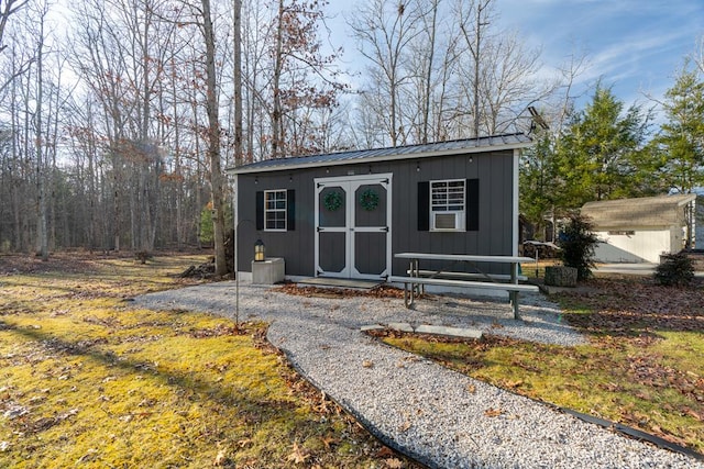 view of outbuilding featuring an outdoor structure