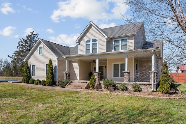 view of front of home featuring covered porch and a front lawn