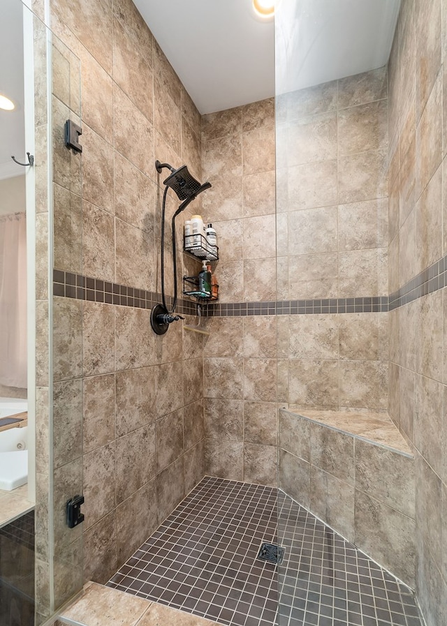 bathroom featuring tiled shower