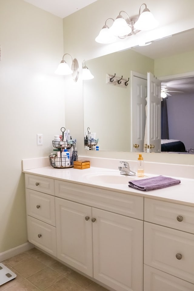 bathroom with vanity, ensuite bath, and tile patterned flooring