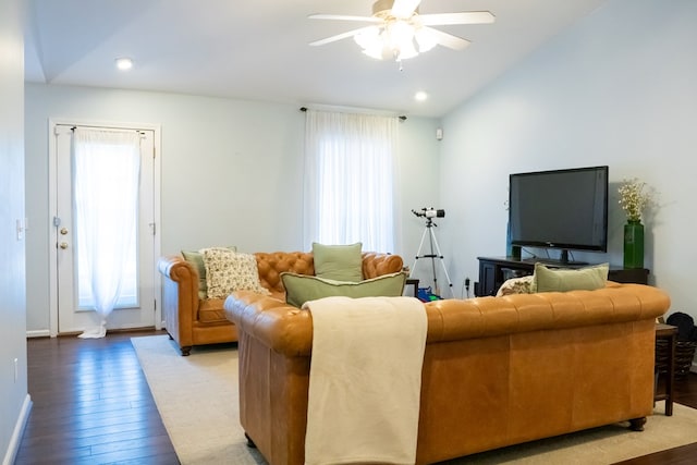 living room featuring lofted ceiling, hardwood / wood-style flooring, recessed lighting, baseboards, and ceiling fan