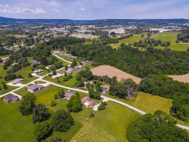 birds eye view of property featuring a rural view