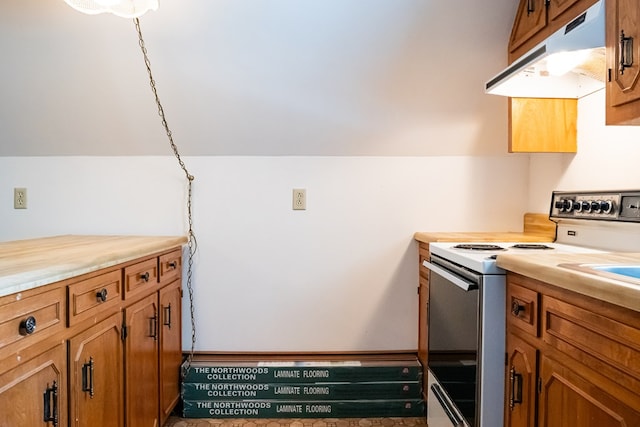 kitchen featuring white electric stove, light countertops, brown cabinetry, and under cabinet range hood