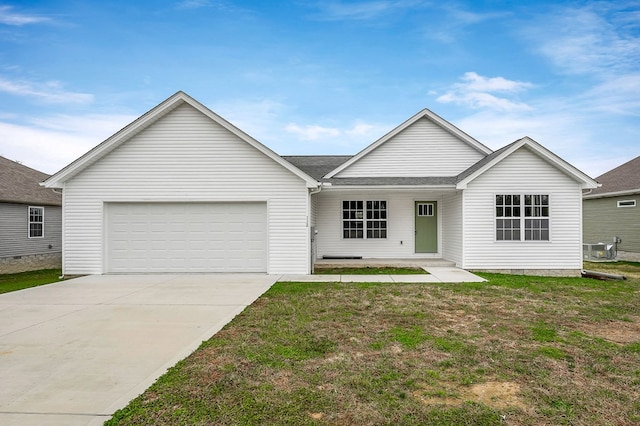 single story home with a garage, a front yard, and driveway