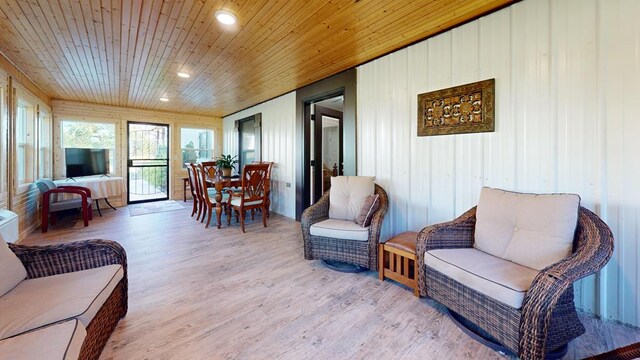 sunroom featuring wooden ceiling