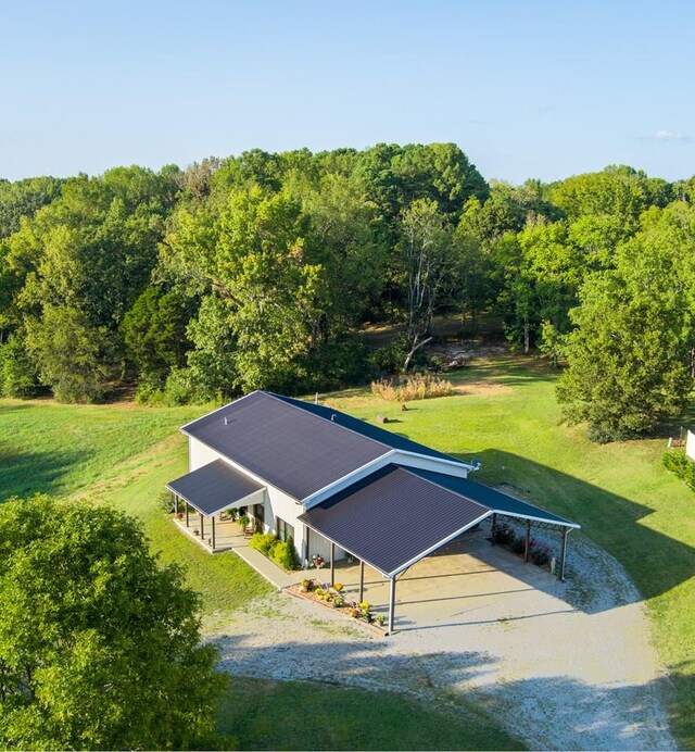 bird's eye view featuring a forest view