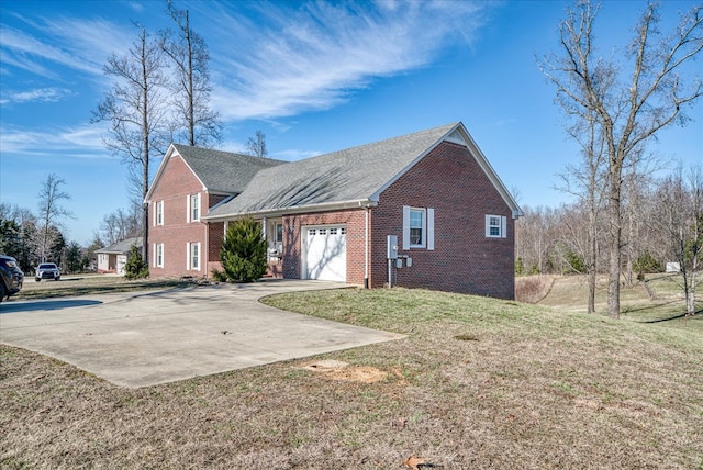 view of property exterior featuring driveway, a garage, a lawn, and brick siding