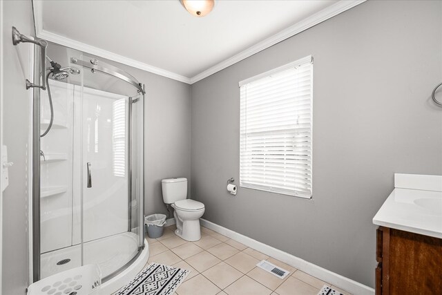 bathroom with crown molding, visible vents, plenty of natural light, and a shower stall