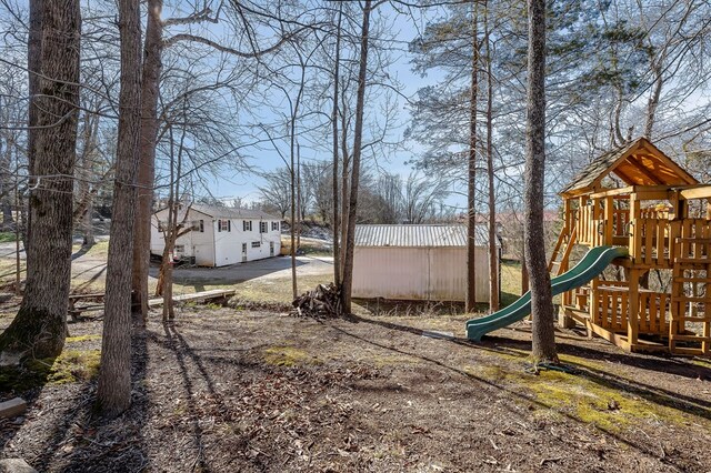 view of yard featuring a playground