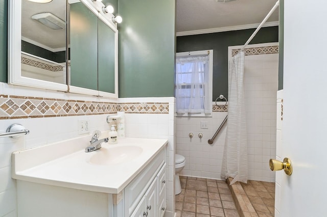 full bathroom with toilet, tile walls, crown molding, and vanity