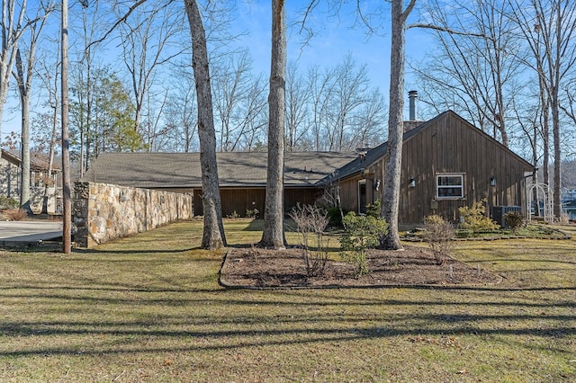 view of home's exterior featuring a lawn