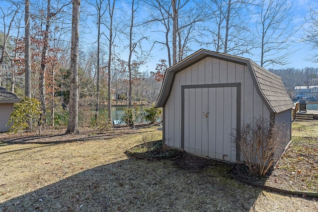 view of shed featuring a water view