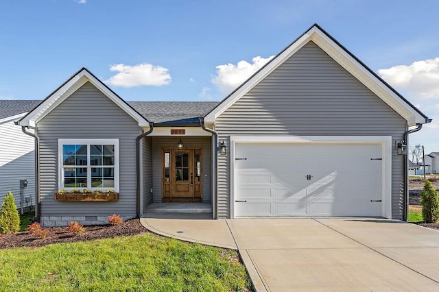 ranch-style house with a garage, driveway, crawl space, and roof with shingles