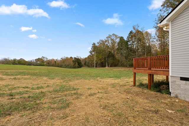 view of yard featuring a deck