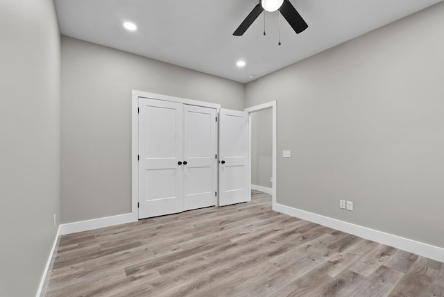 unfurnished bedroom with ceiling fan, recessed lighting, baseboards, a closet, and light wood finished floors