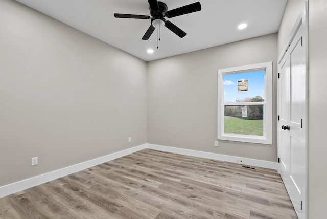 unfurnished room featuring light wood-type flooring, ceiling fan, baseboards, and recessed lighting