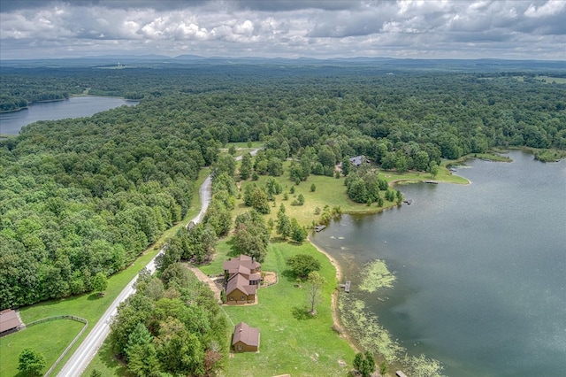 aerial view featuring a water view and a wooded view