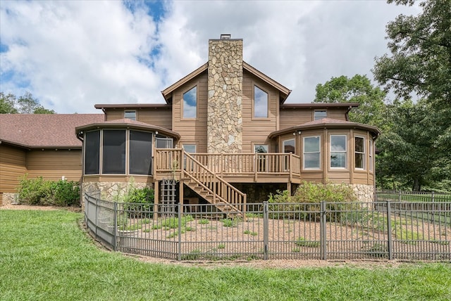 rear view of property with a chimney, a sunroom, fence, a deck, and stairs