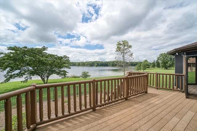 wooden terrace with a water view