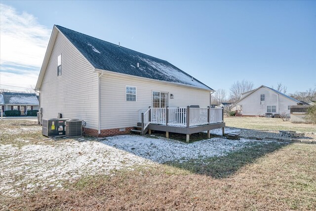 rear view of property featuring central air condition unit, a yard, crawl space, and a wooden deck