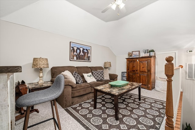 living room with lofted ceiling, carpet floors, ceiling fan, and visible vents