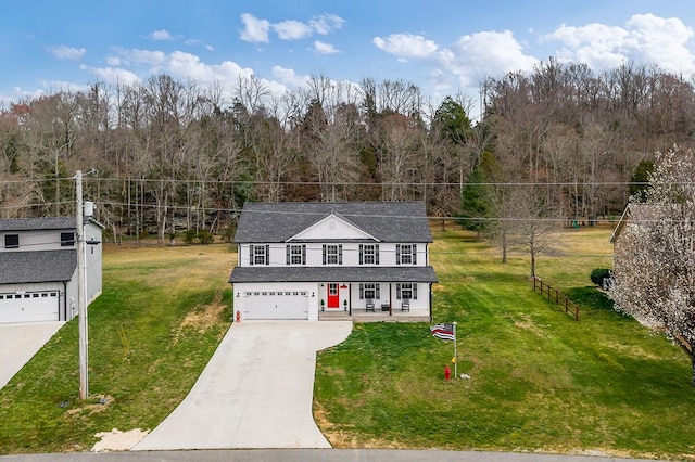 view of front of house featuring concrete driveway, a front yard, a porch, and roof with shingles
