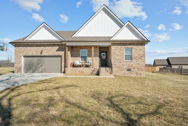 view of front of house with crawl space, concrete driveway, brick siding, and a front lawn