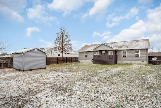 back of property featuring crawl space and a fenced backyard