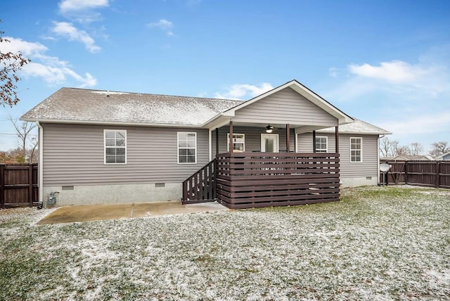 rear view of house featuring crawl space, fence private yard, and a patio