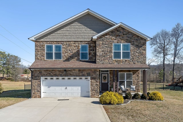 craftsman-style house featuring a garage, a front yard, concrete driveway, and fence