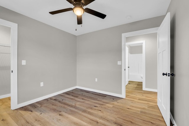 unfurnished bedroom with light wood-style flooring, baseboards, and ceiling fan