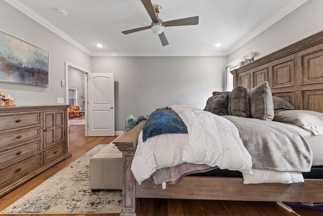 bedroom featuring light wood-style floors, recessed lighting, ornamental molding, and a ceiling fan