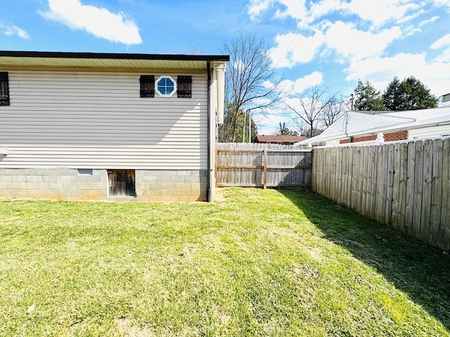 exterior space featuring a fenced backyard